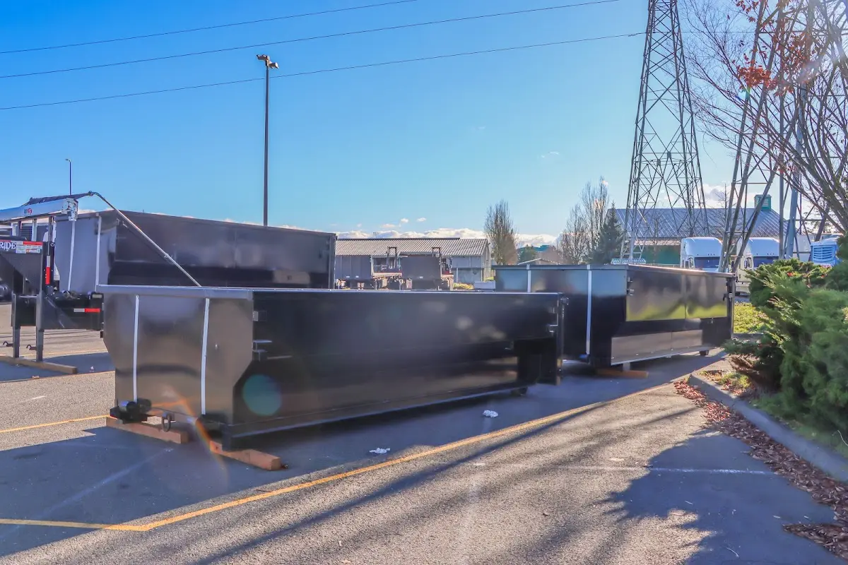 Roll-off dumpster ready for waste disposal at job site for Construction Dumpster Rental in Charles City